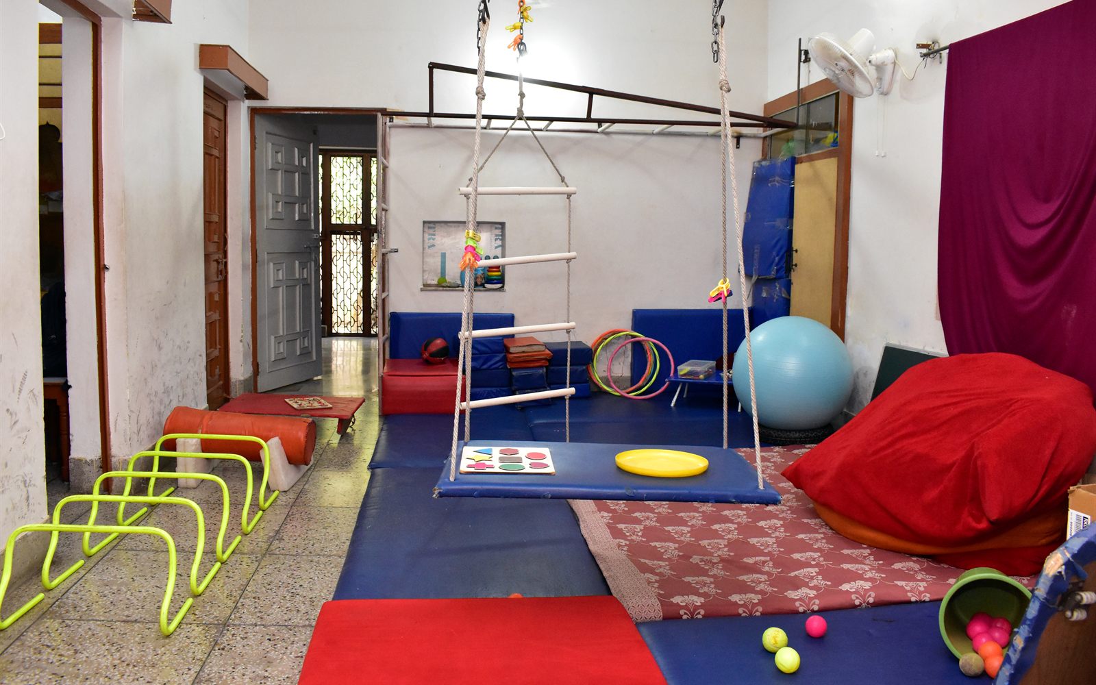 Bright, child-friendly therapy room at ArambH